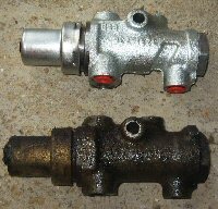 old and new brake limiter valves aka FAM7821
